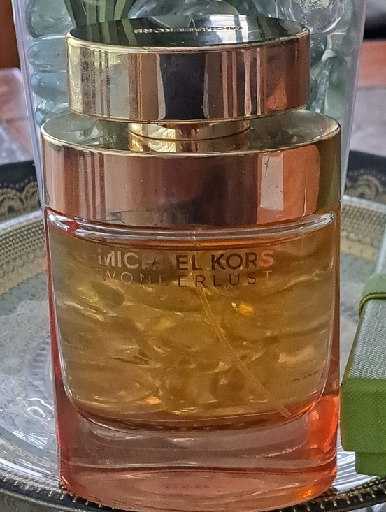 Michael Kors Other - Michael Kors Wonderlust Perfume Bottle in Gold and Amber 3.4fl